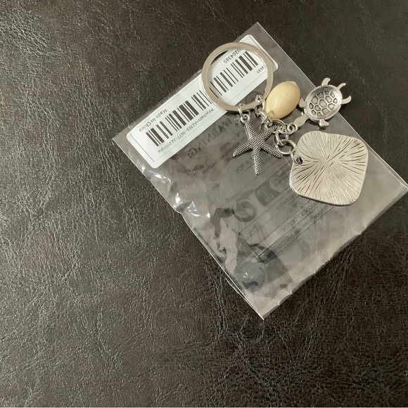 Accessories - Silver Beachy keychain. Starfish, shell, and turtle charms. NWT.